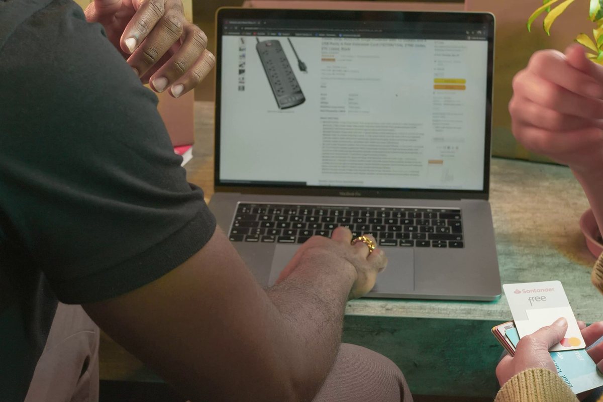 Two people ordering online on a laptop