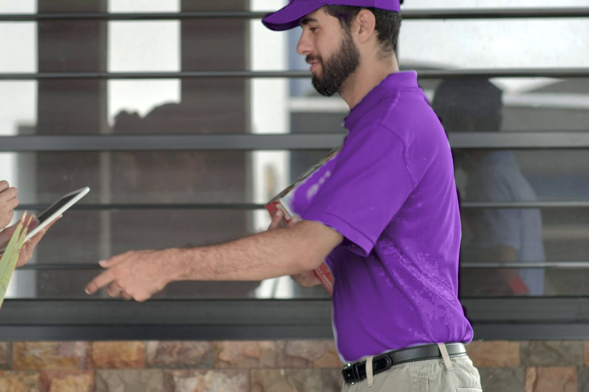 Courier handing over a parcel